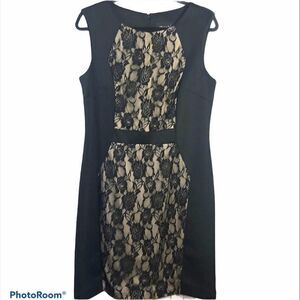 Black sleeveless dress w/ lace detail. Size 10